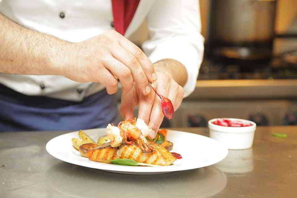 A Chef arranging his plate
